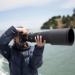 Photographer With Big Lens